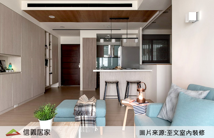 以吧檯的形式做代替，不但能保有用餐位置，下方也可以做為收納空間的使用。